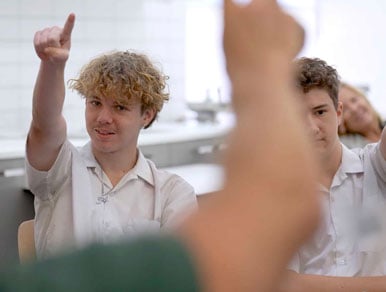 Teenage boys taking part in a kai-fella school workshop for mental health